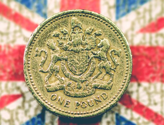 pound-coin-and-uk-flag