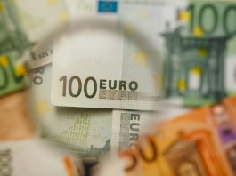 eur-bank-notes-magnifying-glass - EUR